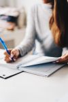 Woman taking notes